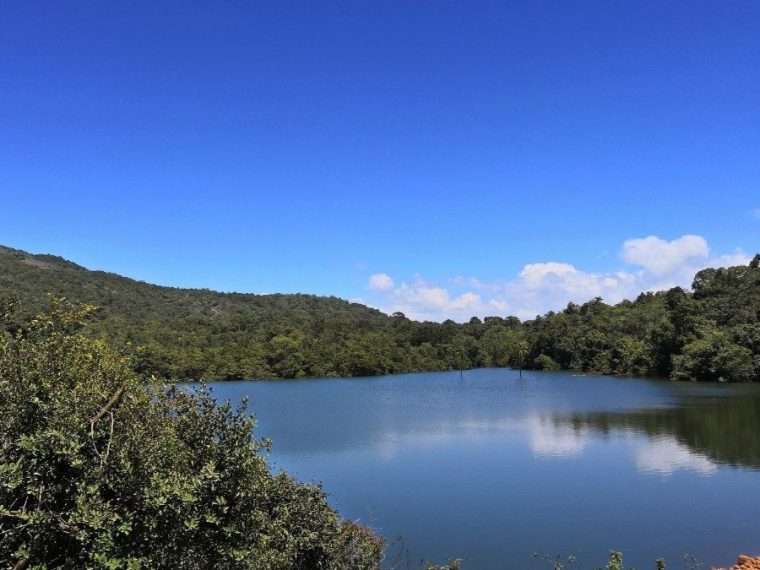 A pristine lake reflecting the clear blue sky with clouds floating like white cotton. These landscapes make Shimoga one of the best summer destinations in India