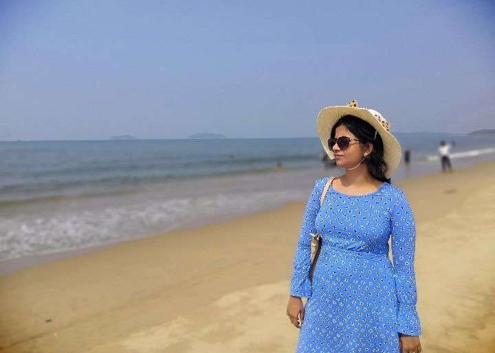 Me in my favorite blue dress donning a sun-hat at the Tagore Beach in Karwar