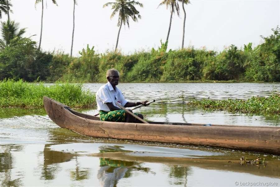 fishermen at work in Alleppey Backwaters kerala