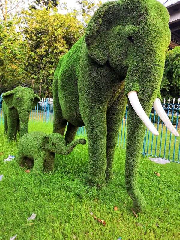 Princep Ghat Kolkata - A walking guide to the beautiful riverfront 2 Grass sculptures of three elephants welcome you at the entrance of Princep Ghats, Kolkata. A giant mother-elephant with her two baby elephants