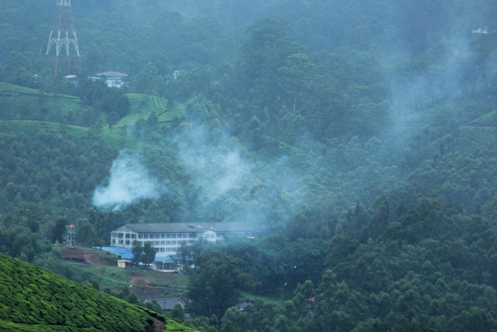 A beautiful bungalow in the misty valley during monsoon in Munnar