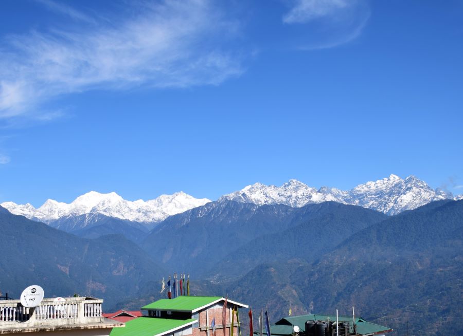 Top 17 Places with the Best Views of Kanchenjunga 10 Picturesque views of Kanchenjunga from a hotel balcony in lower Pelling, showcasing the mountain's grandeur and the serene surroundings